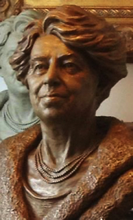 Close-up view of the bronze bust of Eleanor Roosevelt, emphasizing facial expression and sculpted hair.