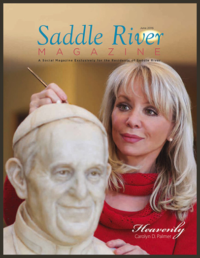 Magazine cover featuring sculptor Carolyn D. Palmer working on a clay bust in her studio.